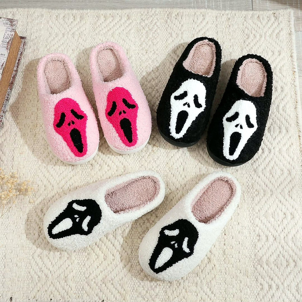 Spooky Face Fuzzy Slippers worn at home