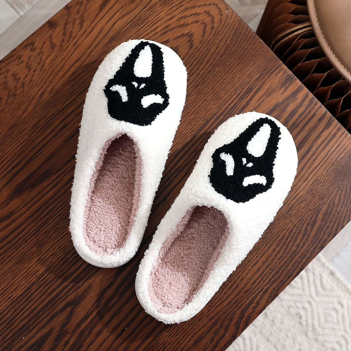 Spooky Face Fuzzy Slippers worn at home