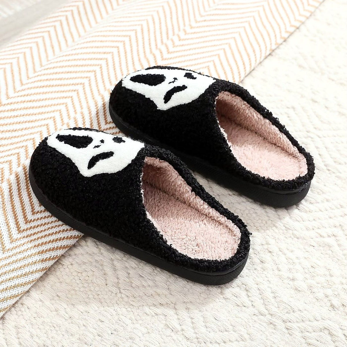 Spooky Face Fuzzy Slippers worn at home