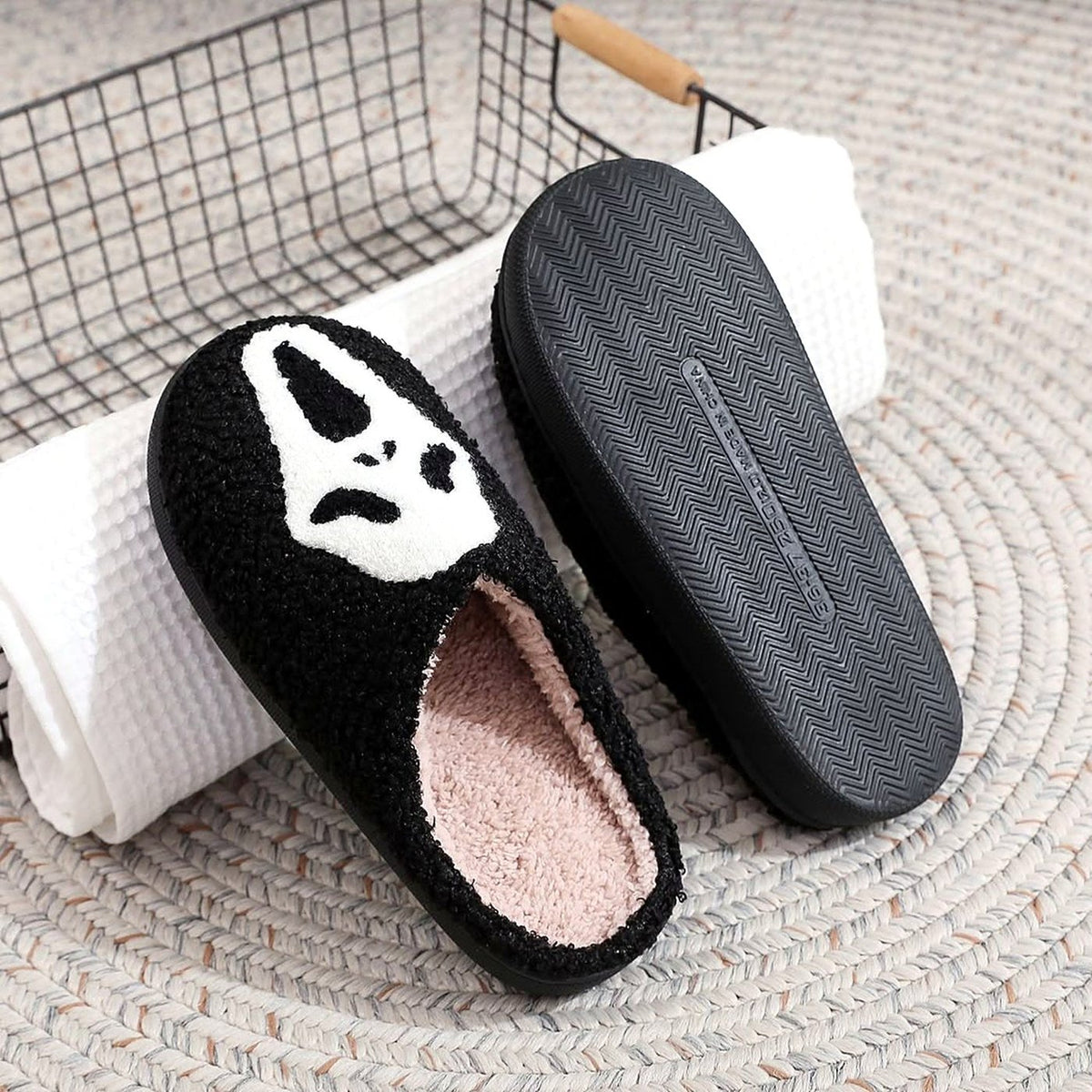 Spooky Face Fuzzy Slippers worn at home