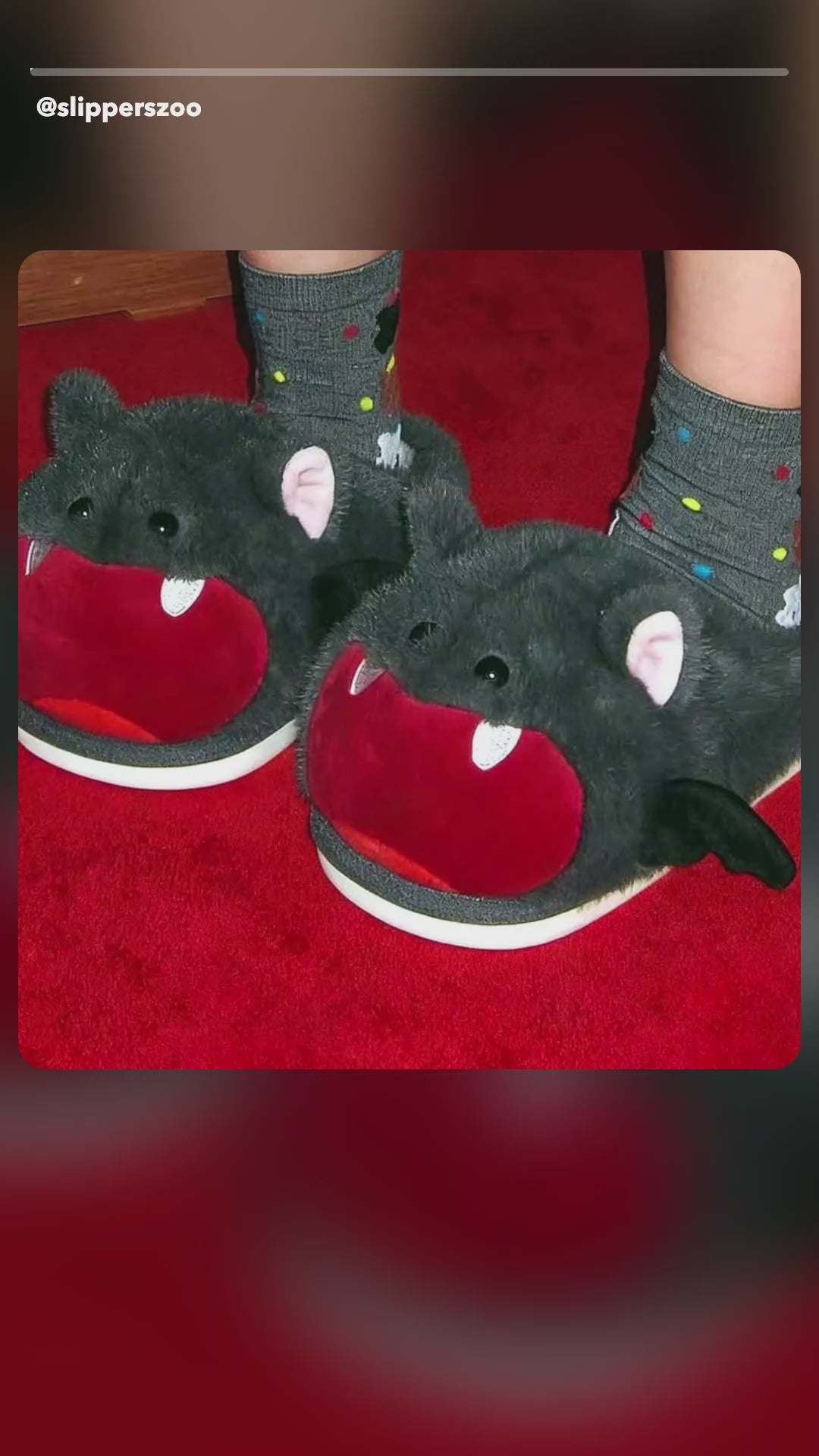 UGC-style video: Vampy Bat Fluffy Slippers worn at home, showing the felt fangs, pink plush lining and tiny wings