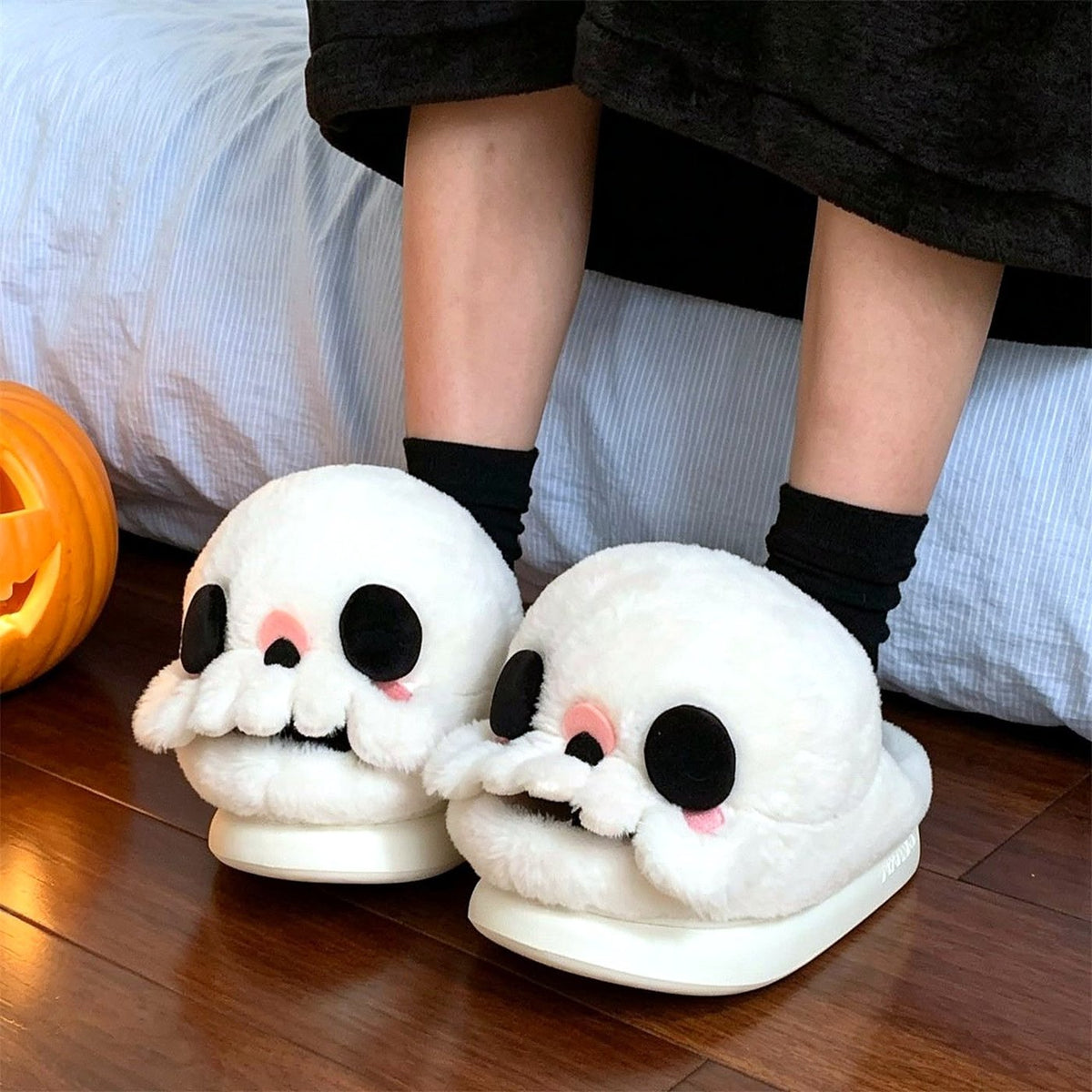 Boo Skull Fluffy Slippers worn at home