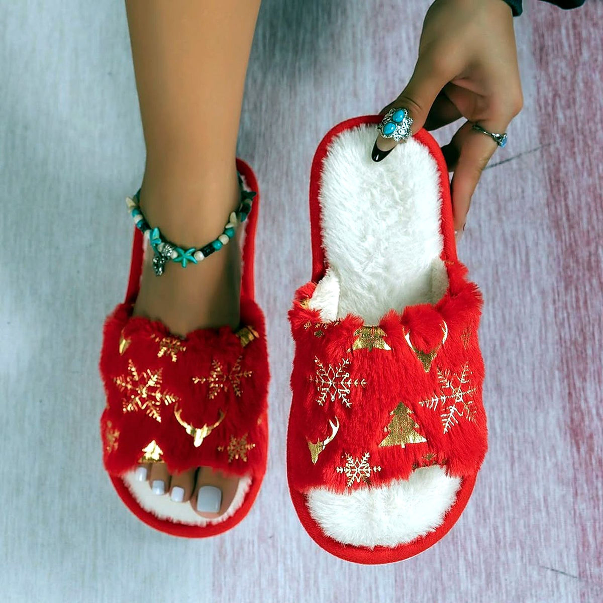 Golden Snowflake Fuzzy Slides worn at home
