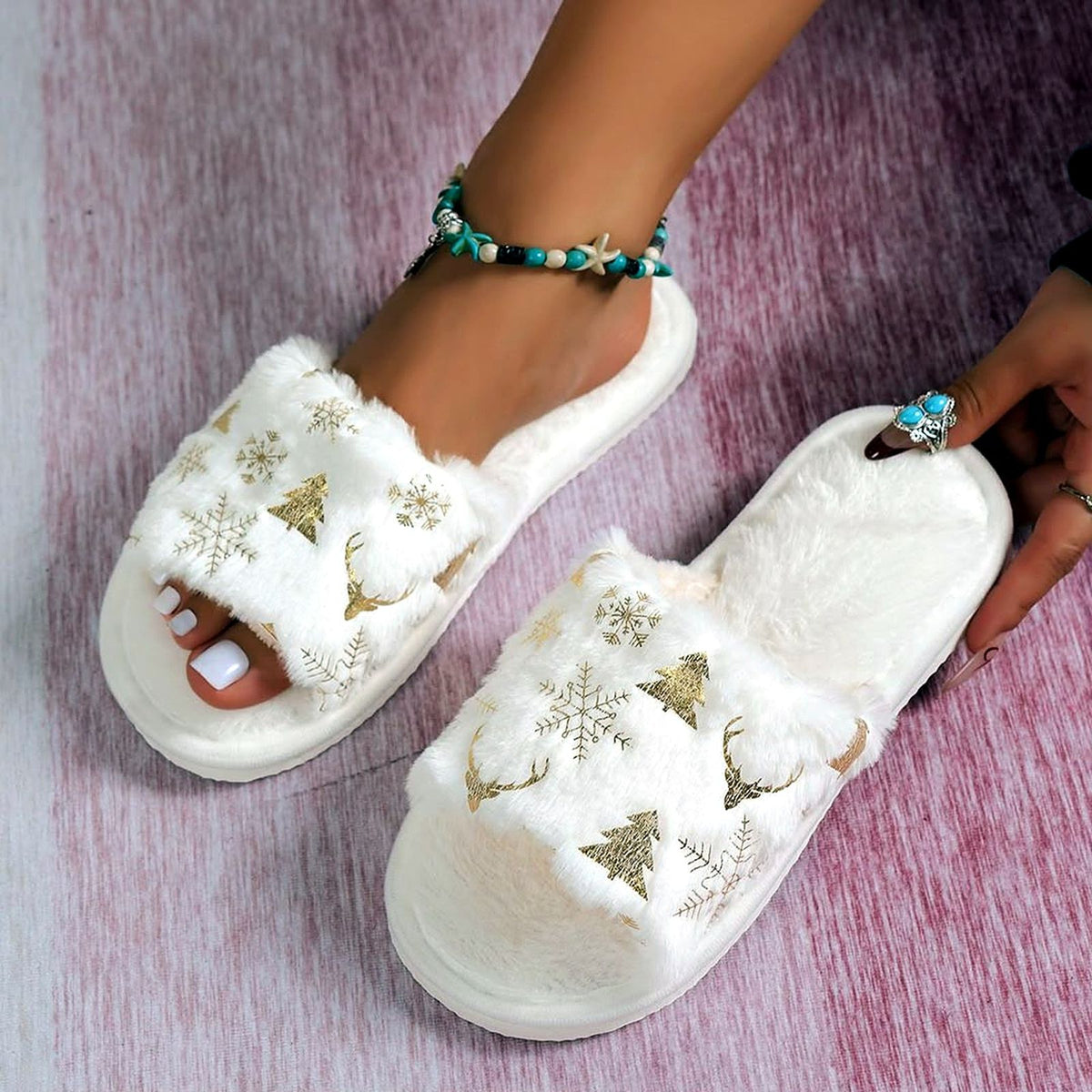 Golden Snowflake Fuzzy Slides worn at home